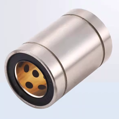 A standard and extended length oilless linear bearing with a visible external retaining groove.